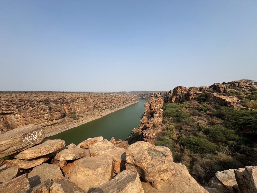The green Penna river running through the red rock canyon at Gandikota, Andhra Pradesh, India
