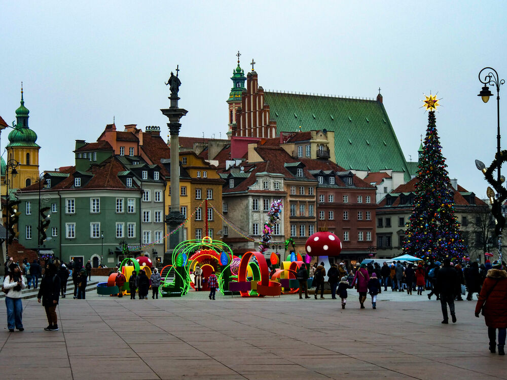 Castle Square in Warsaw with Sigismund's Column, Christmas decorations and a decorated tree, December